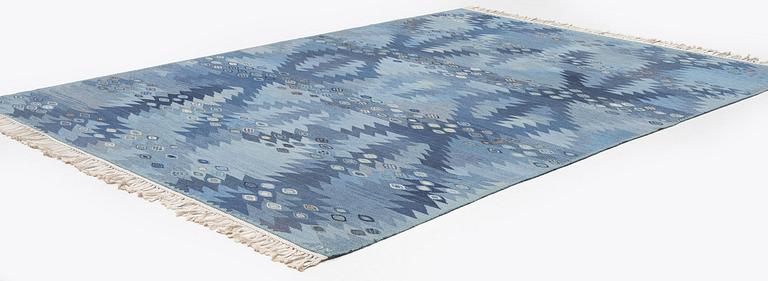 Barbro Nilsson, a carpet, 'Tånga mellanblå', flat weave, c. 350 x 252 cm, signed AB MMF BN.