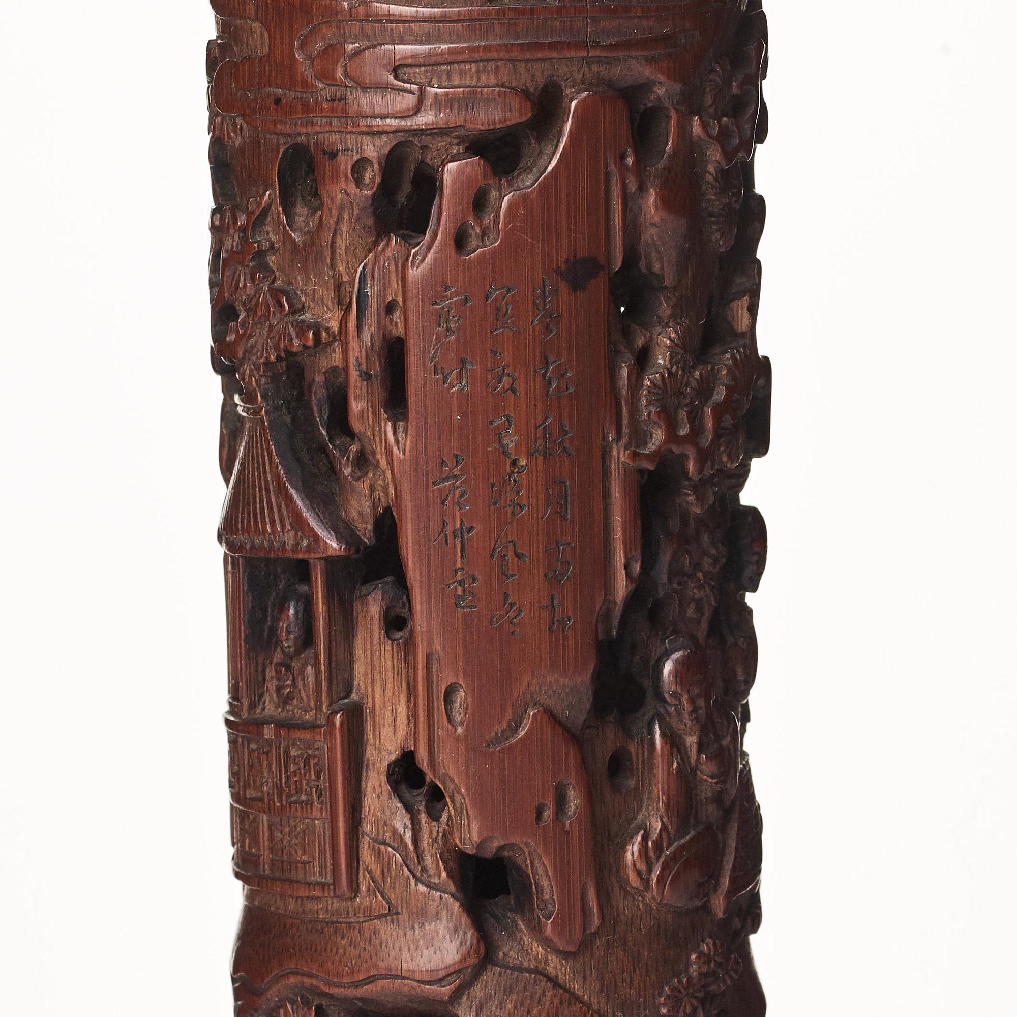 A carved cylindrical bambo parfumier, Qing dynasty, 19th Century.