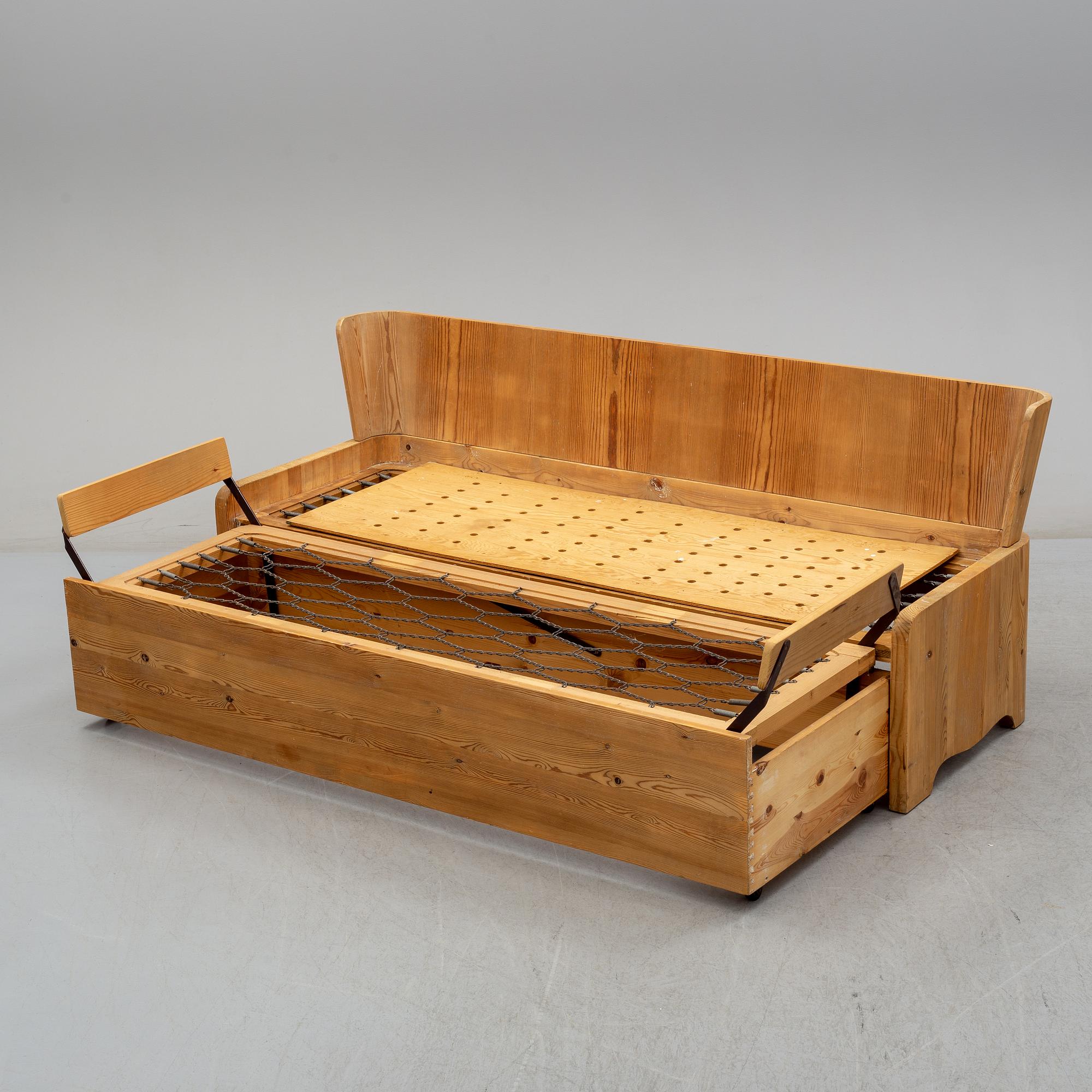 A second part of the 20th century pine sofa by Göran Malmvall.