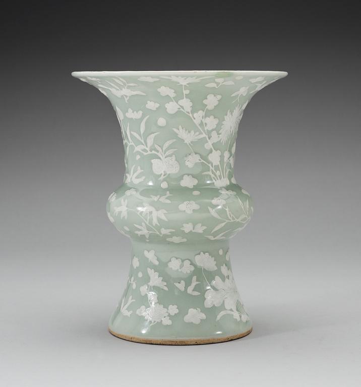 A celadon slip decorated vase, Qing dynasty, Kangxi (1662-1722).