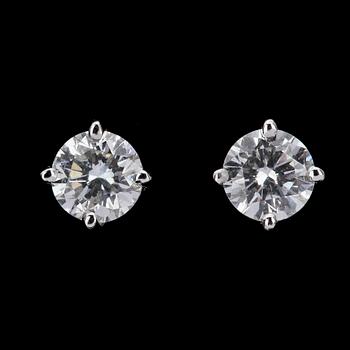 1067. EARSTUDS, each brilliant cut diamond, 0.52 cts.