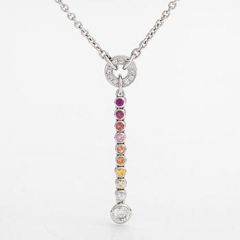 An 18K whitegold necklace with a diamond ca 1.01 ct, smaller diamonds tot. ca 0.15 ct, ruby and 
sapphires, Helsinki.