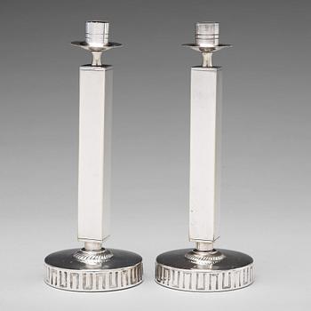 241. KARL WOJTECH, a pair of Swedish Grace candlesticks, 1920's-30's.