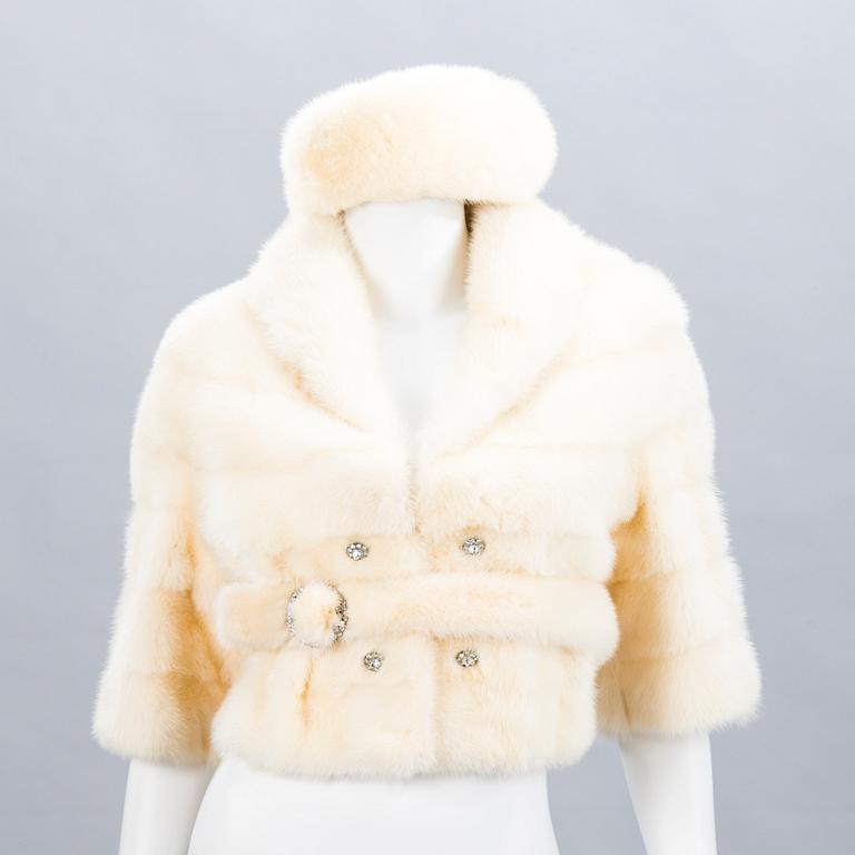 Mink Jacket with a belt and a hat.