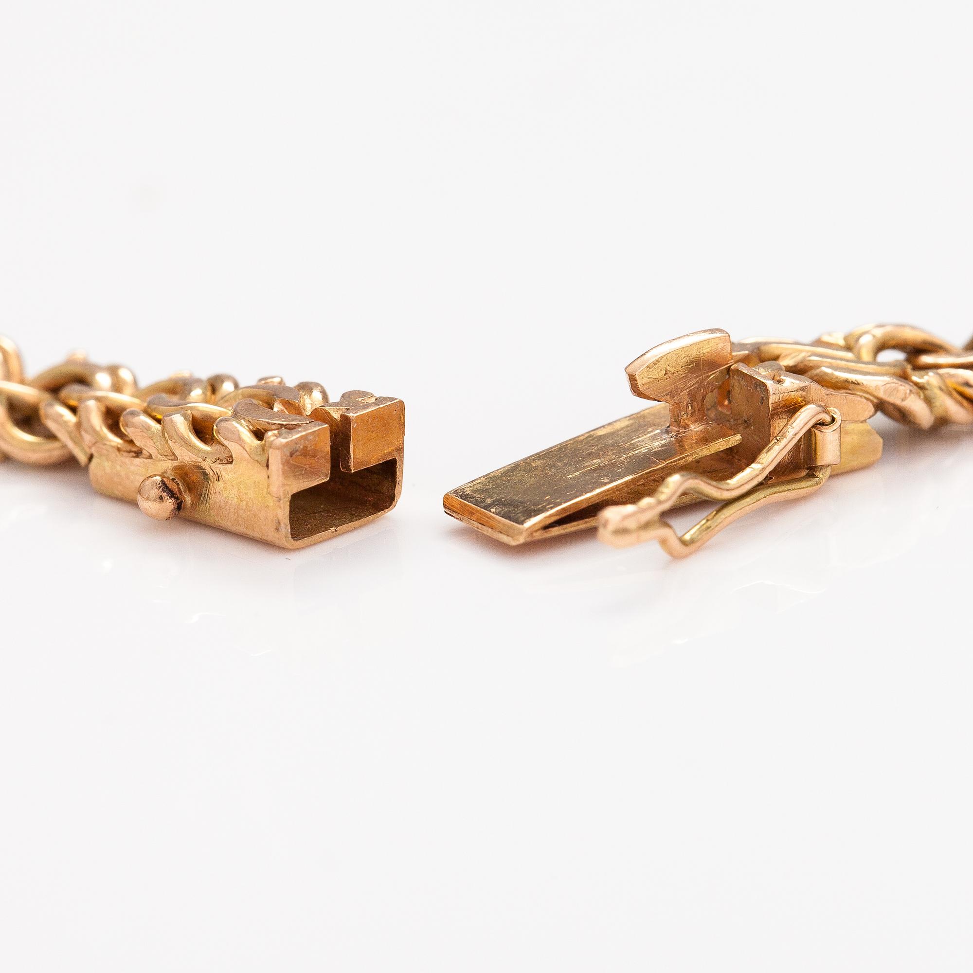 A 14K gold necklace. Russian hallmarks.