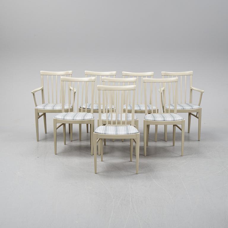 A dining table with two armchairs and six chairs by Carl Malmsten for Bodafors.