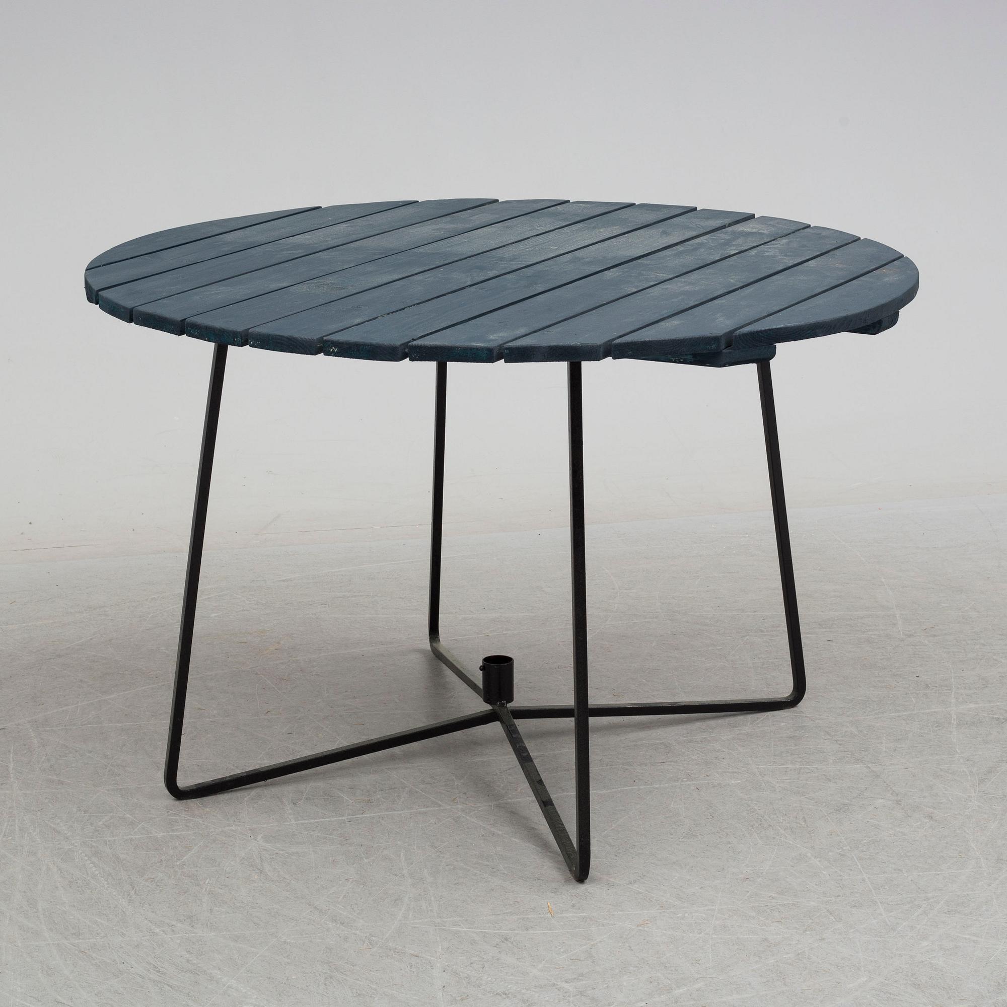 A mid 20th Century garden table from Grythyttan.