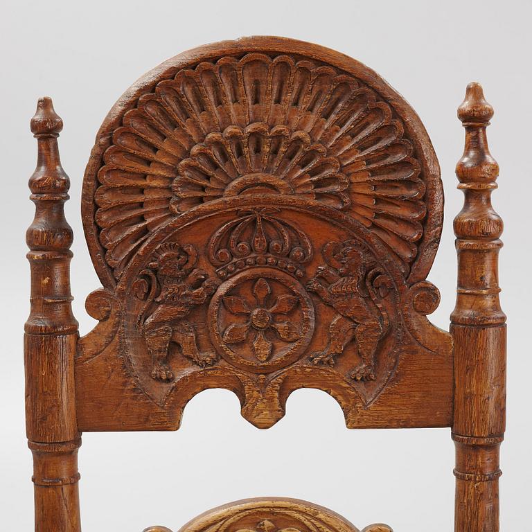 A pair of Spanish colonial style ladder-back chairs, circa 1900.