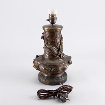 An early 1900's Japanese bronze table lamp.
