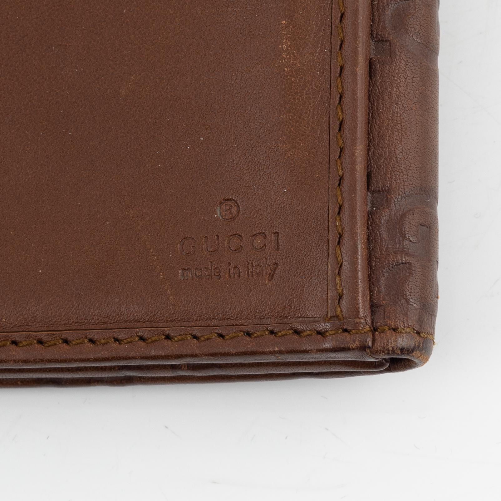 Gucci, leather wallet.