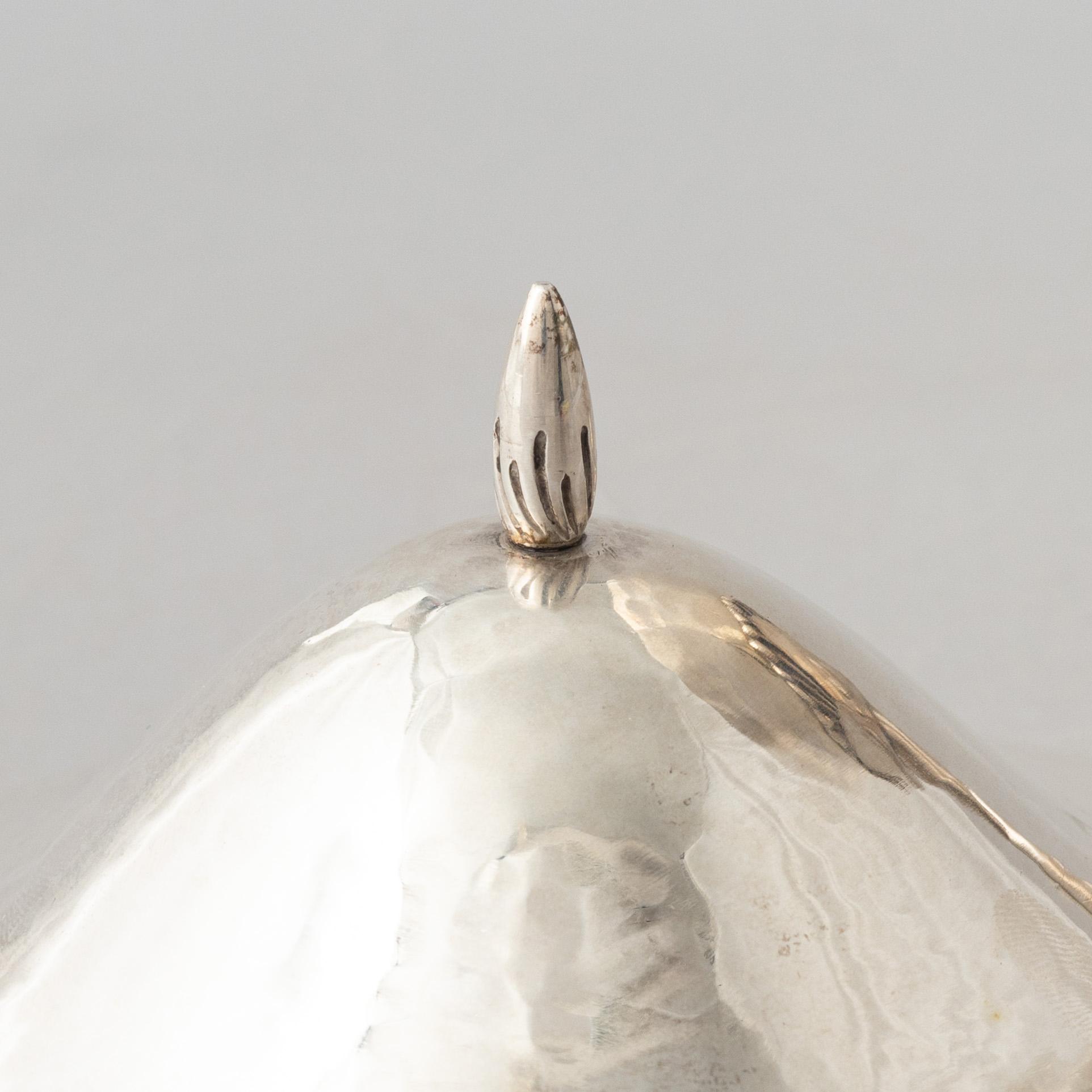 A silver sugarbowl with cover, Swedish import marks, Malmö 1919.
