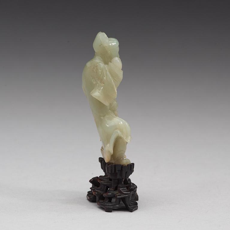 A nephrite sculpture of a man, Qing dynasty (1644-1912).