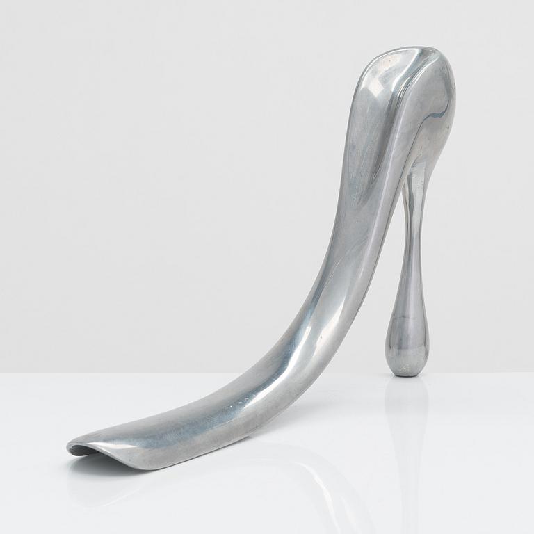A metal shoe horn by Manolo Blahnik, 2000s.