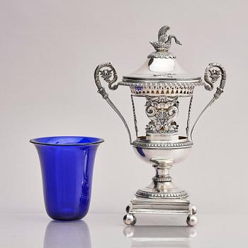 Lockurna, silver med blå glasinsats, Frankrike 1800-talets början.