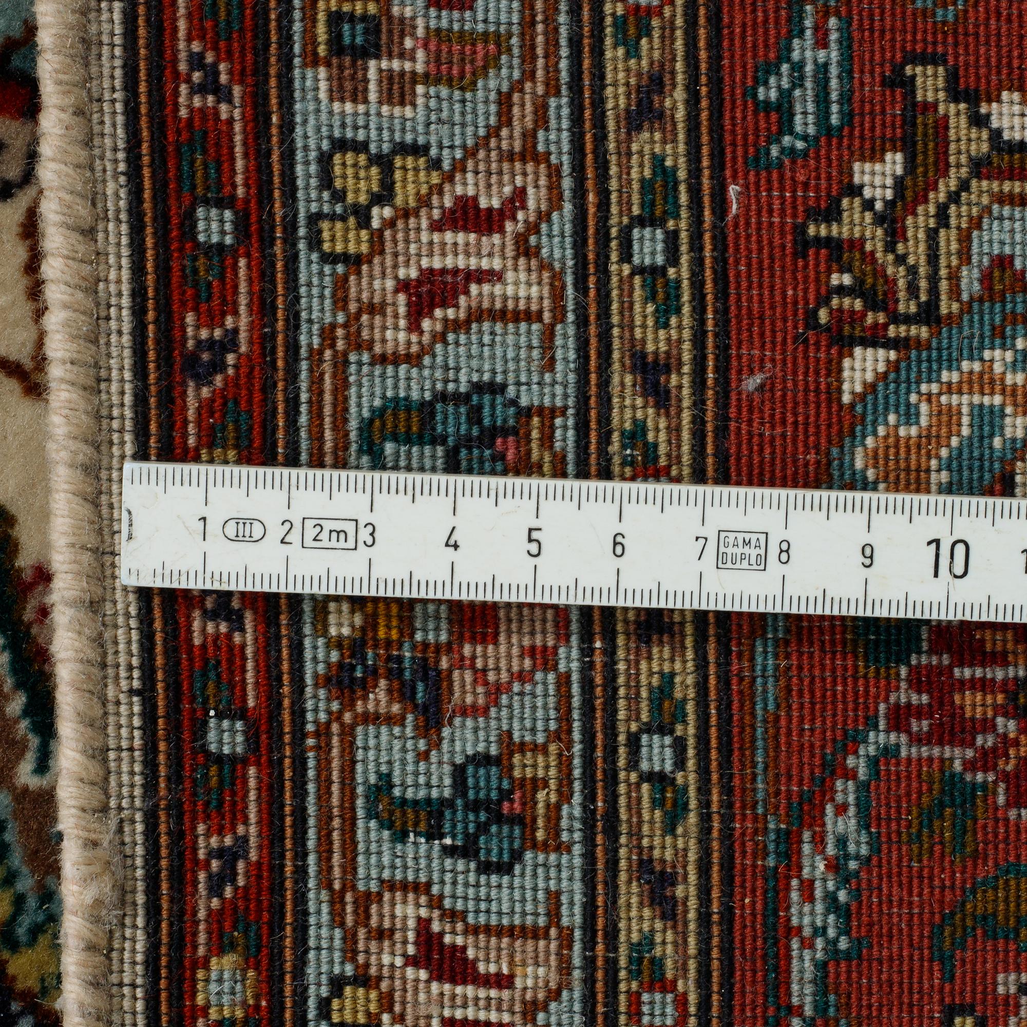 A rug, Old Tabriz, part silk, ca204 x 152 cm.