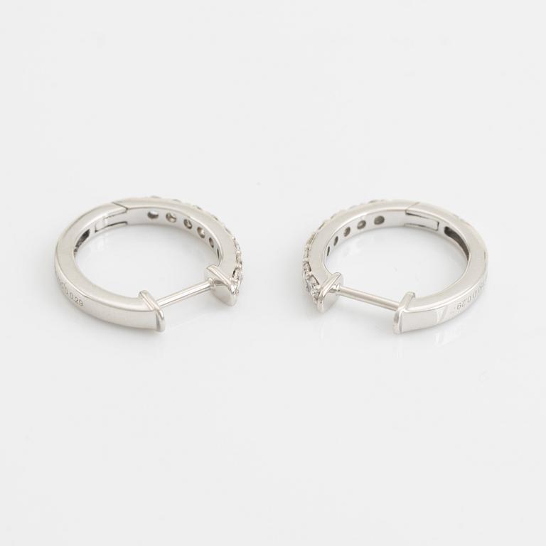 Brilliant cut diamond hoop earrings, total 0,58 ct.
