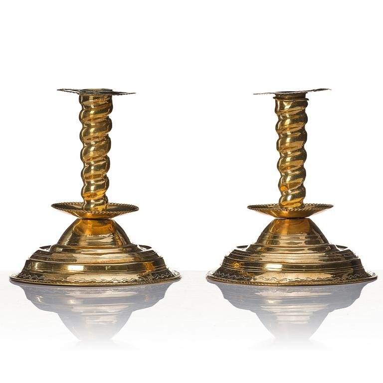 A pair of late Baroque candlesticks.