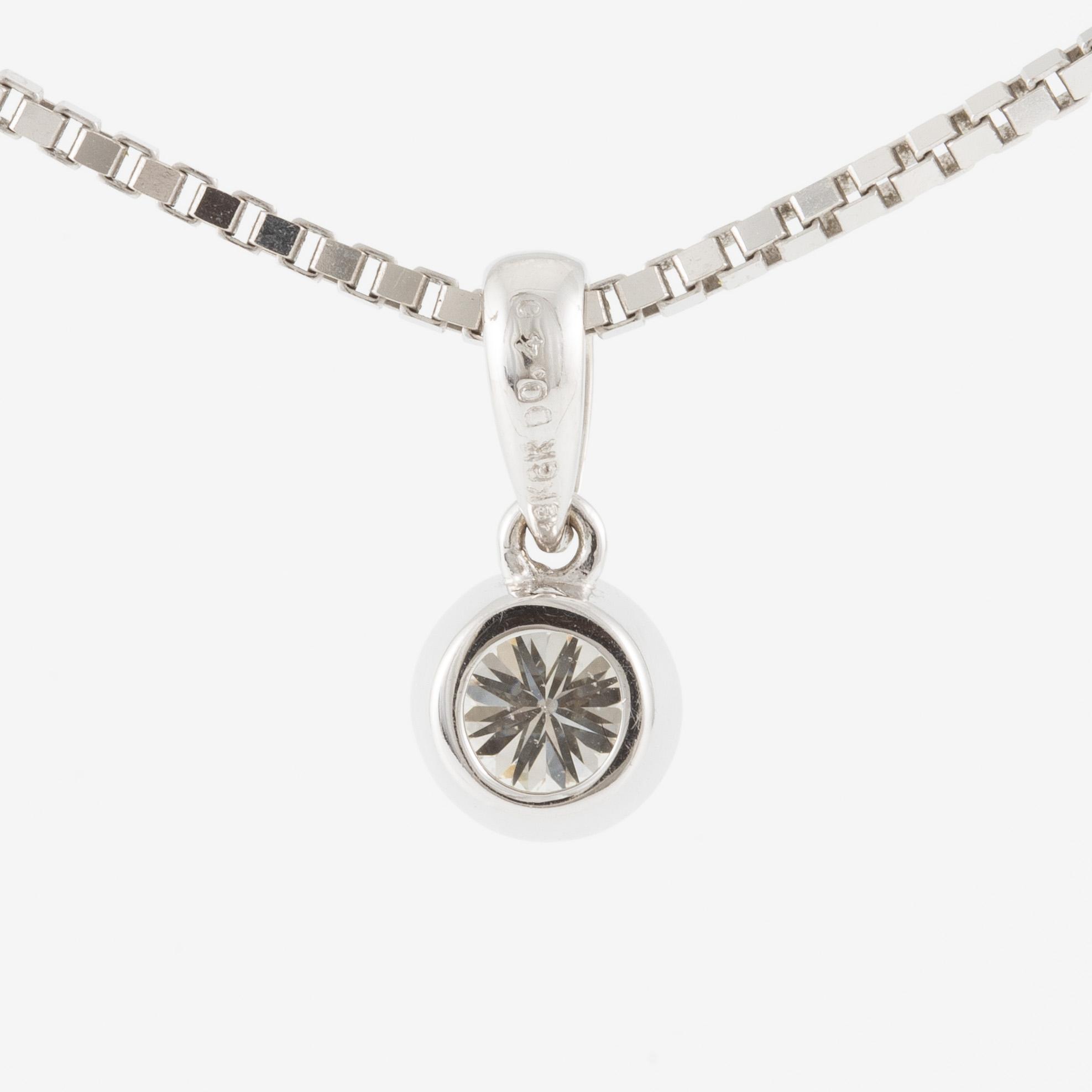 Collier 18K vitguld med briljantslipad diamant 0.40 ct.