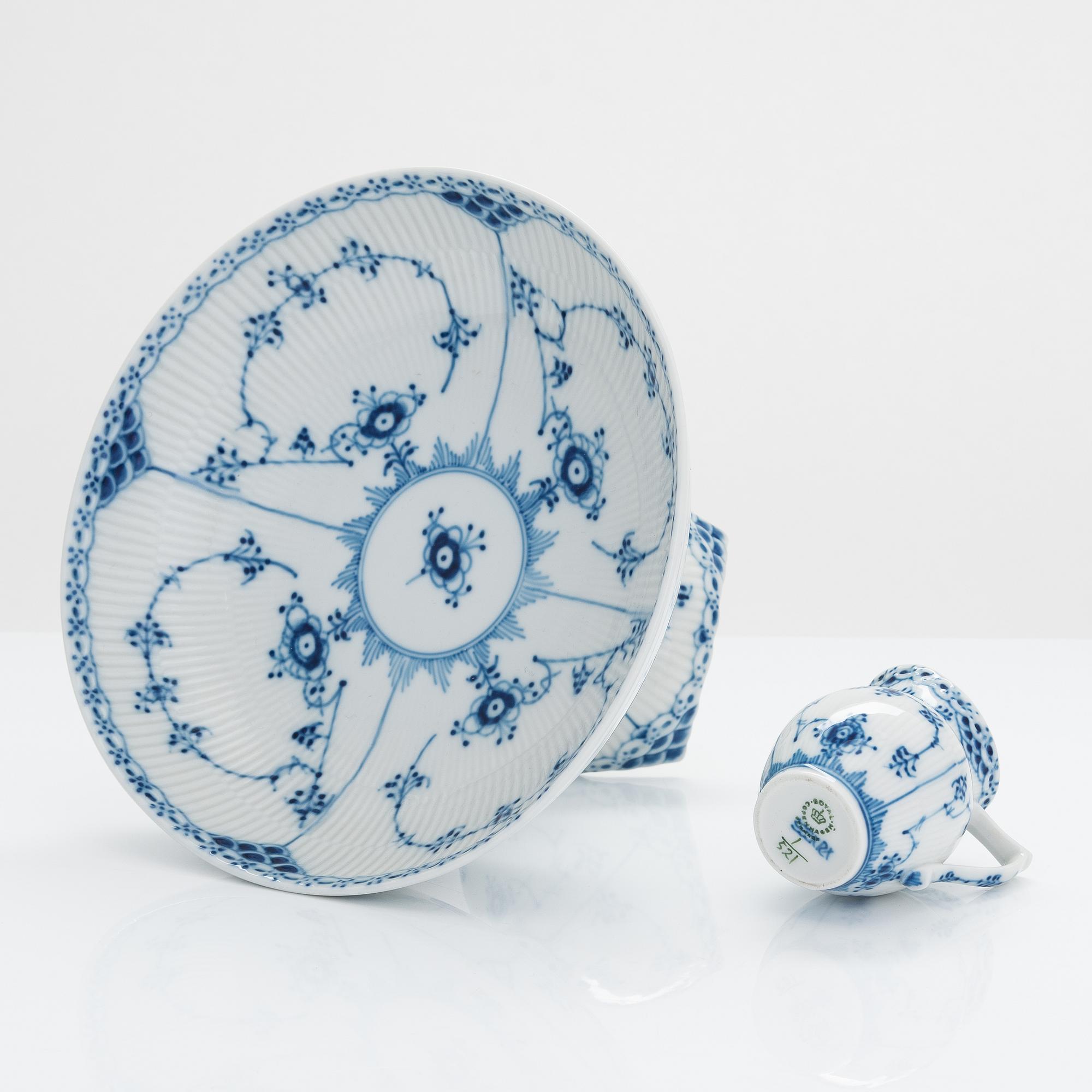 A 31-piece Royal Copenhagen 'Musselmalet' porcelain coffee set.