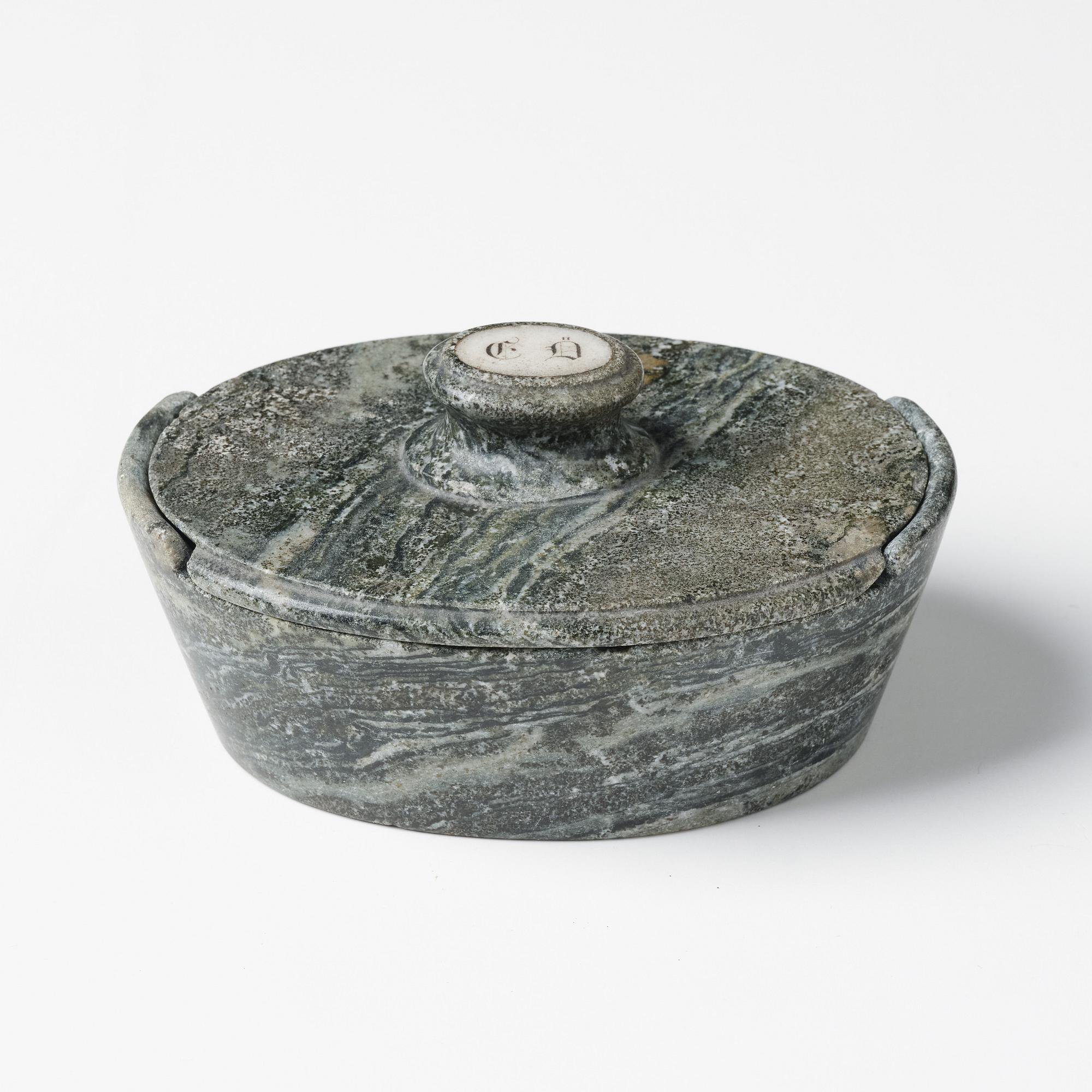 A Swedish Empire 'Kolmård' marble butter box with cover, early 19th century.
