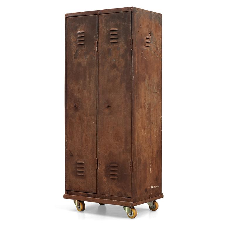 A 20th century patinated metal changing room cabinet.