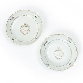 Cups and saucers, 11+7, and a teapot in famille rose with monogram, company porcelain, China, 18th century.