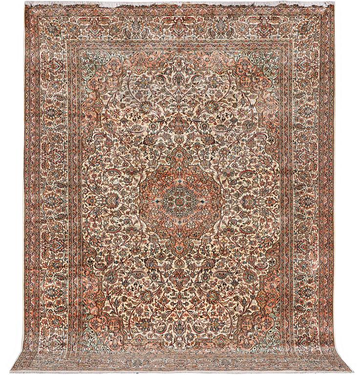 A carpet, silk Kashmir, ca 303 x 216 cm.