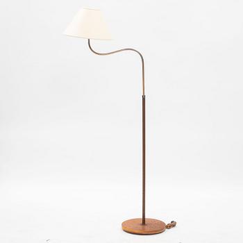 A Swedish Modern floor lamp, marked Nike, mid 20th century.