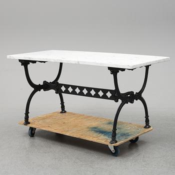 An end of the 20th Century aluminum and marble garden table.