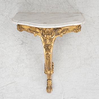 A Swedish rococo-style console table, 19th century.