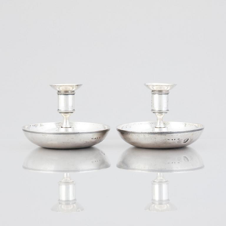 A pair of Swedish early 19th century silver chamber-candlesticks, mark of Adolf Zethelius, Stockholm 1816.