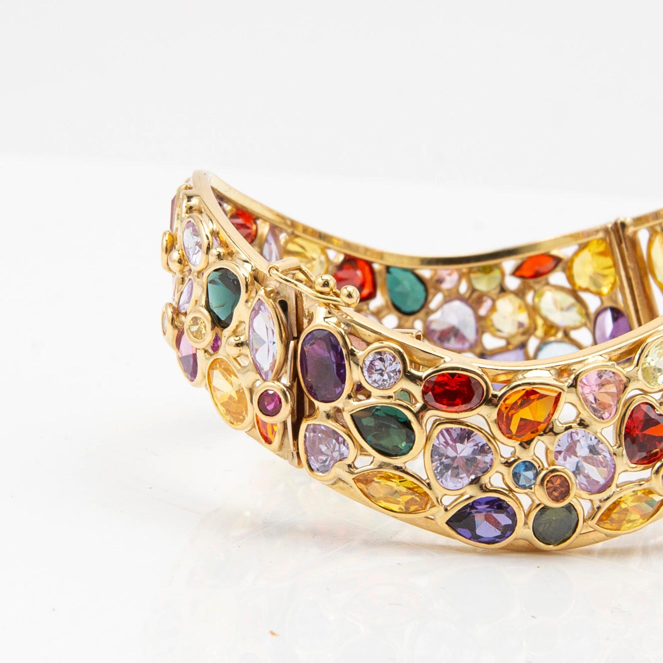Armring, 18K gold with coloured gemstones, Italy.