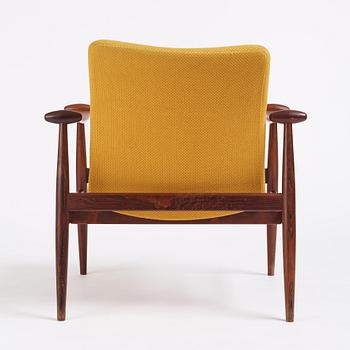 Finn Juhl, a 'model F-133' rosewood easy chair by France & Son, Denmark 1960s.