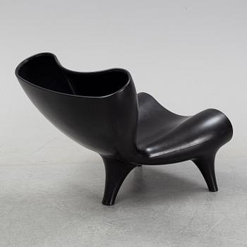 A Marc Newson, a 'Orgone' chair, designed 1993.