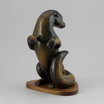 GUNNAR NYLUND, a stoneware sculpture of an otter, Rörstrand, Sweden.