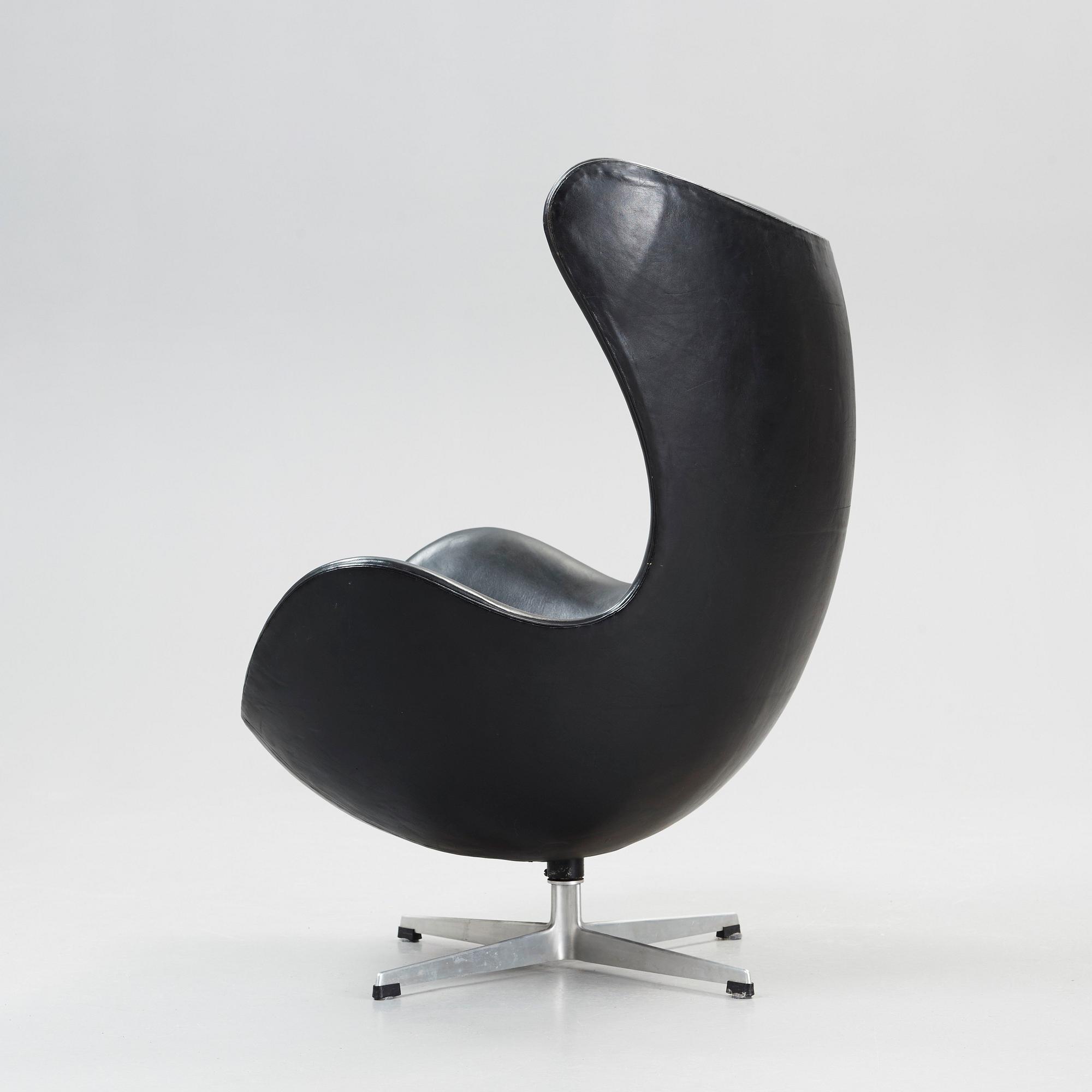 An Arne Jacobsen black leather 'Egg' chair, Fritz Hansen, Denmark 1964.