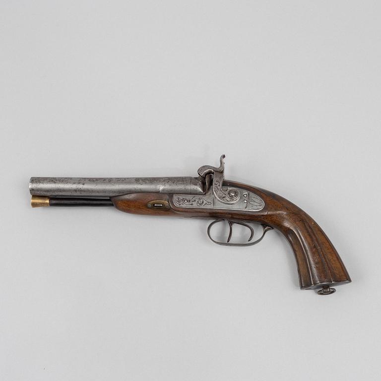A double-barrelled percussion pistol, second half of the 19th century.