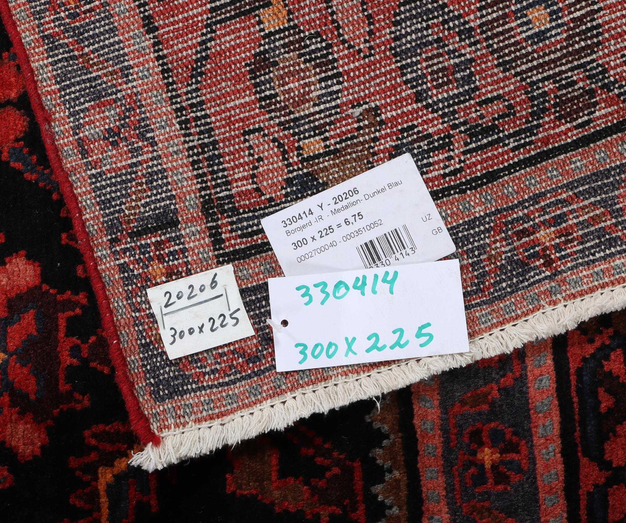 A Borojerd carpet, c. 300 x 225 cm.