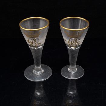 A pair of 18th Century wine glasses.