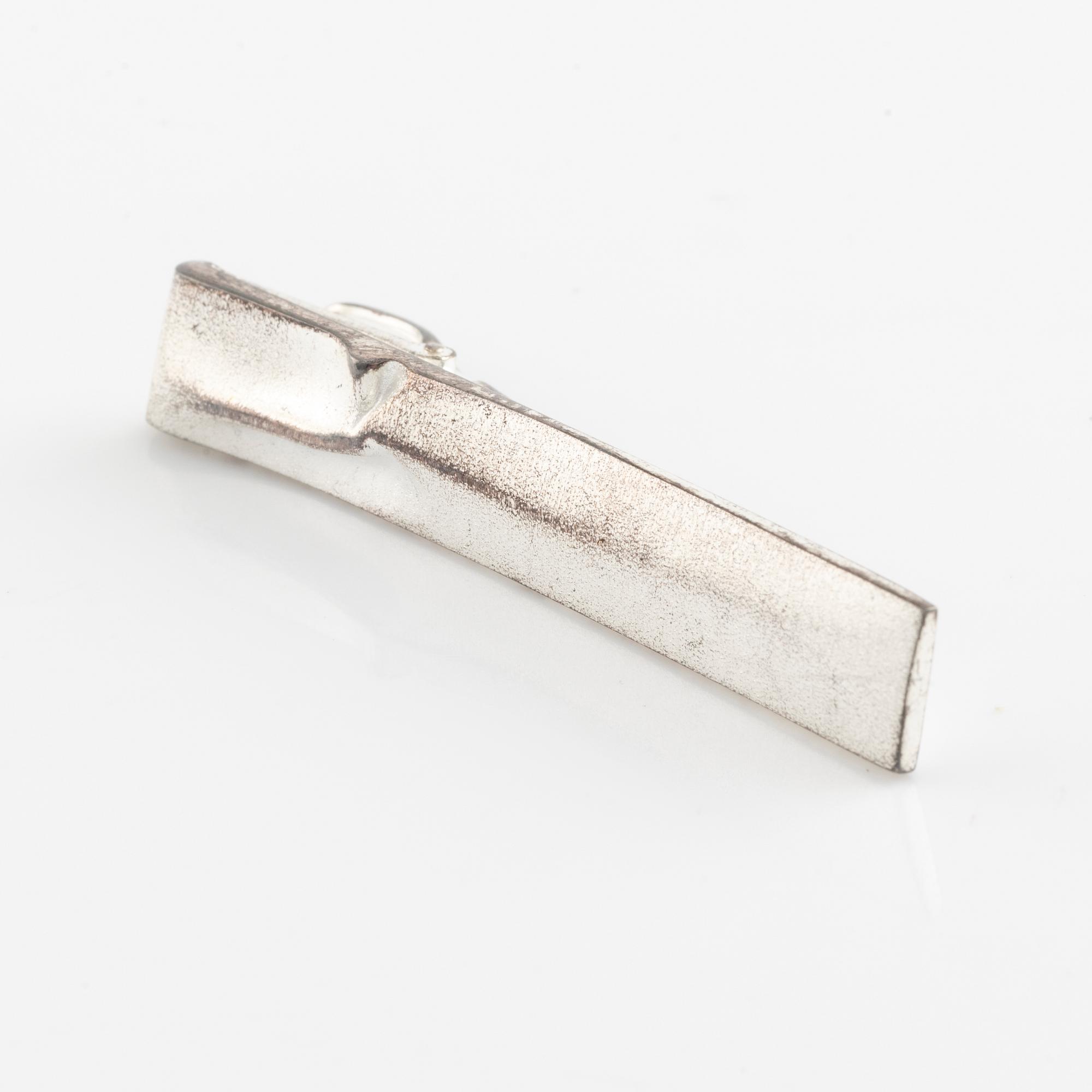 Lapponia, two sterling silver rings and tie ping.