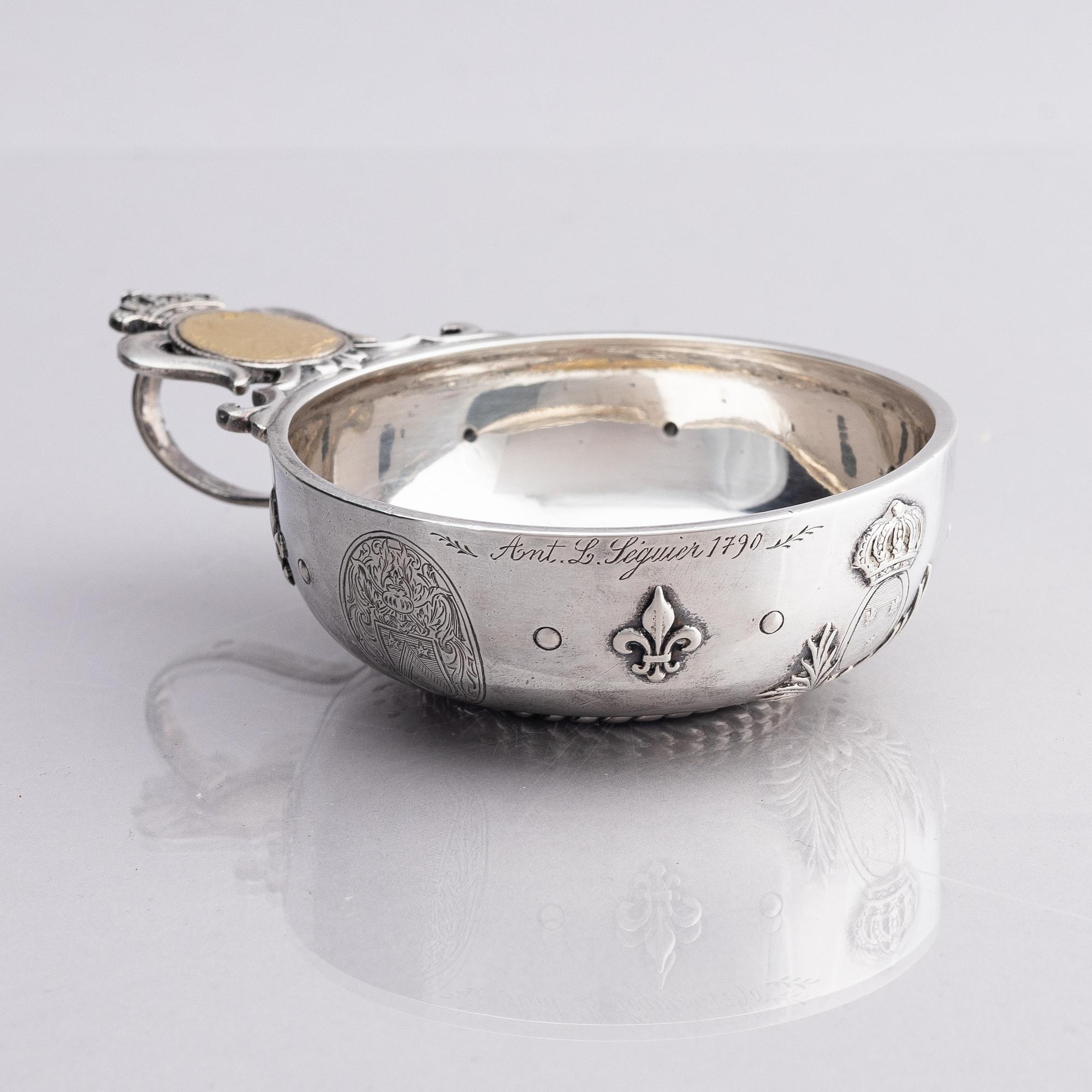 An 18th century French parcel-gilt silver tasse du vin (wine taster).