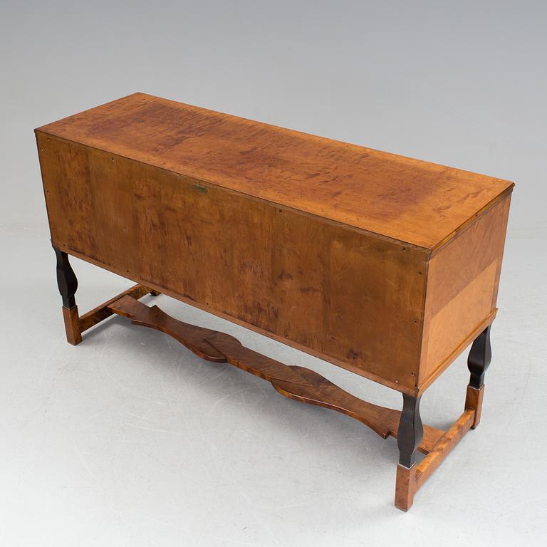 A dining furniture set comprising of eight pieces by Carl Malmsten.