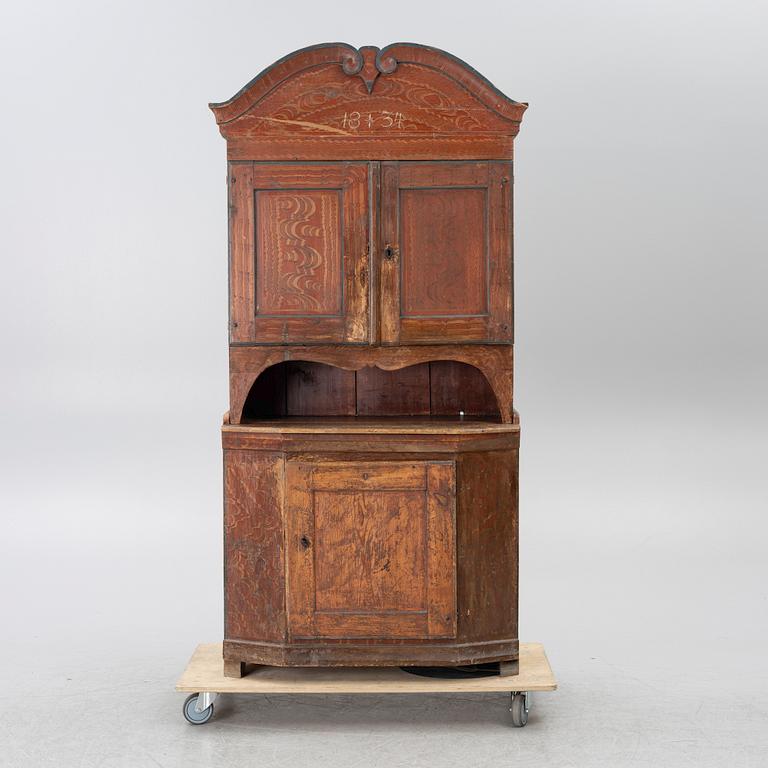 A 19th century Folk art gift cabinet.