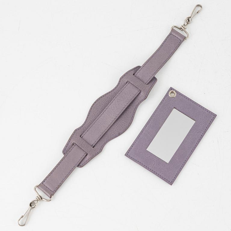 Balenciaga, a purple leather 'City' handbag.