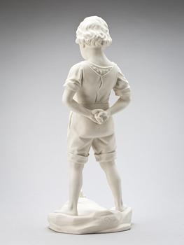 FIGURIN, parian. Gustavsberg, stämpelsignerad 1927.
"Pojken och grodan". Höjd 48 cm.