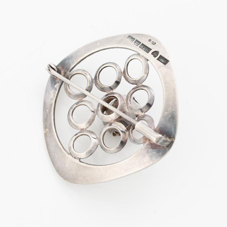 Arm ring and brooch, silver with smoky quartz, Kultasepät Salovaara.