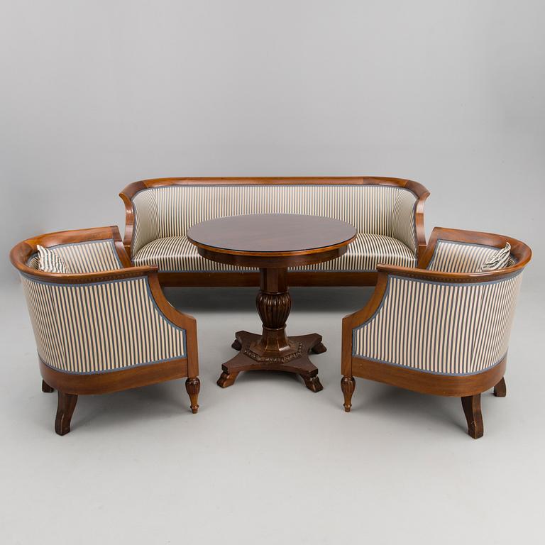 A mid-late 19th Century four-piece sofa suite.