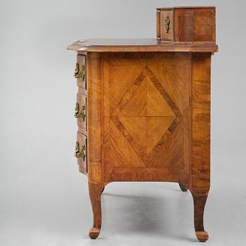 A late baroque walnut parquetry commode by C. Linning (master in Stockholm 1744-79).