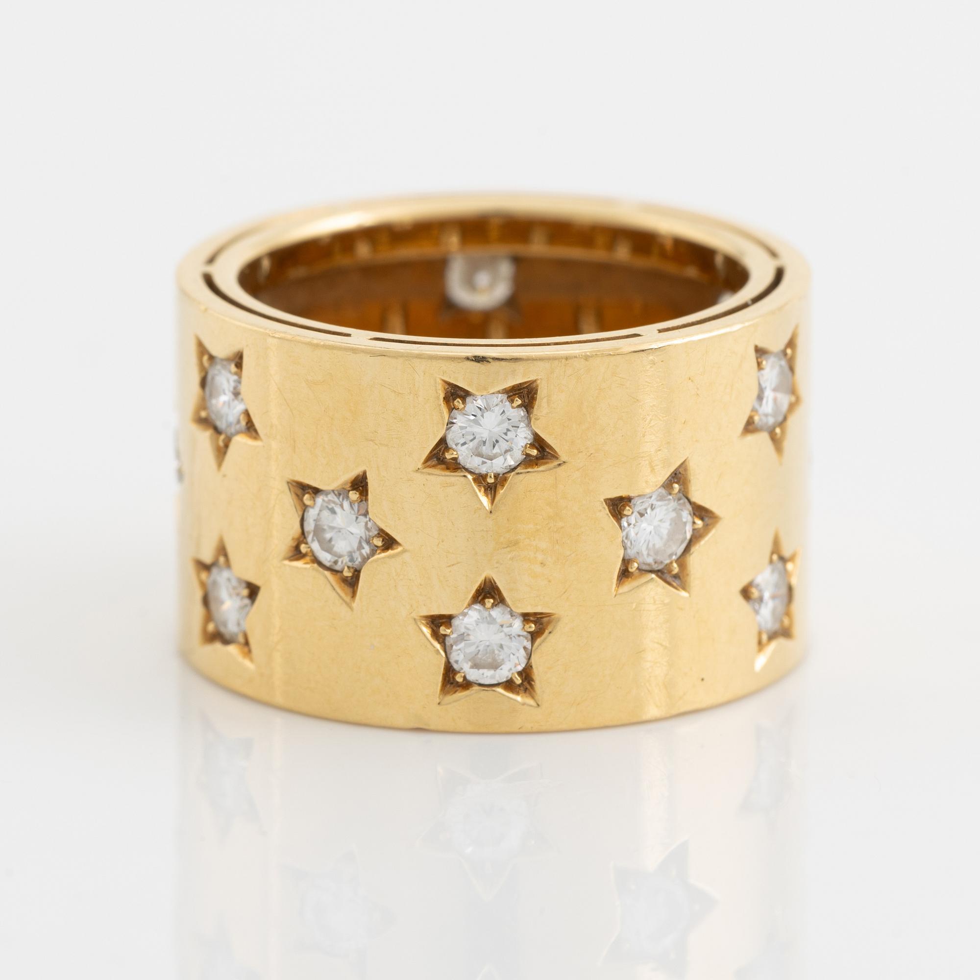 Brilliant cut diamond star shaped ring.