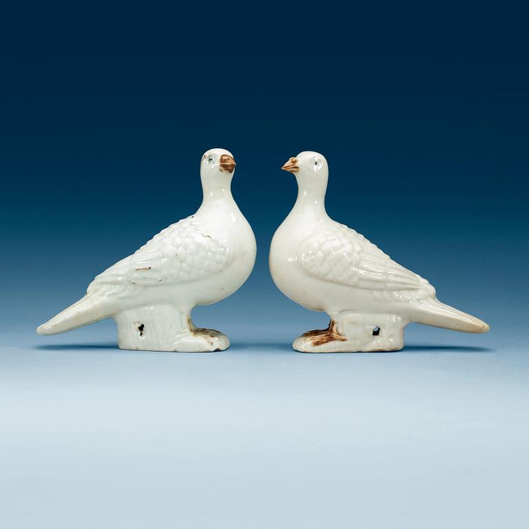 A pair of white and brown glazed doves, Qing dynasty Qianlong, ca 1775.